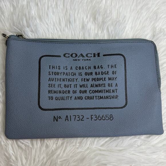 Coach Handbags - COACH Blue Pouch